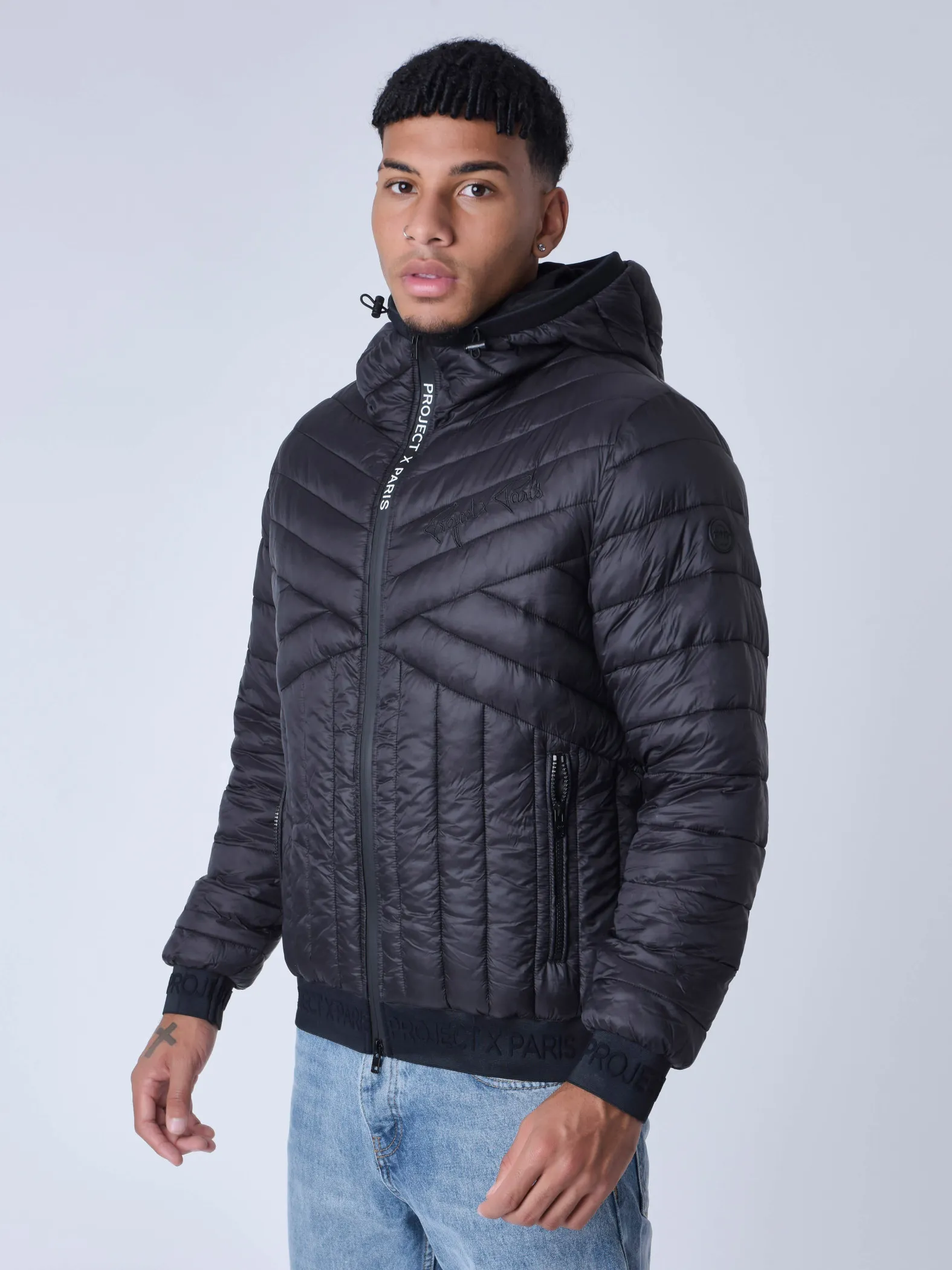 Chaqueta de plumón acolchada geométrica