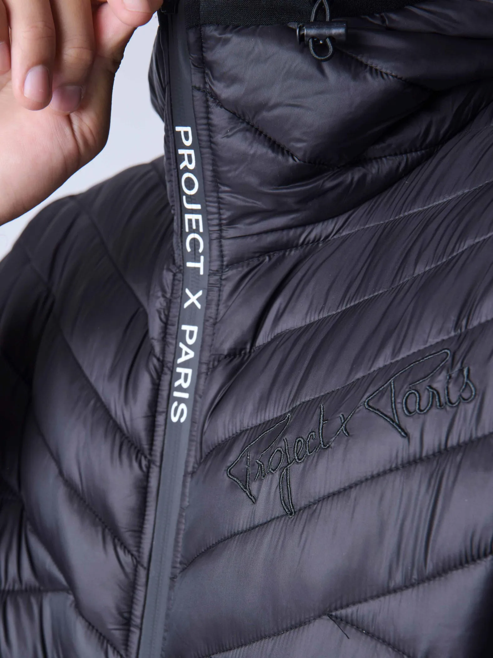 Chaqueta de plumón acolchada geométrica