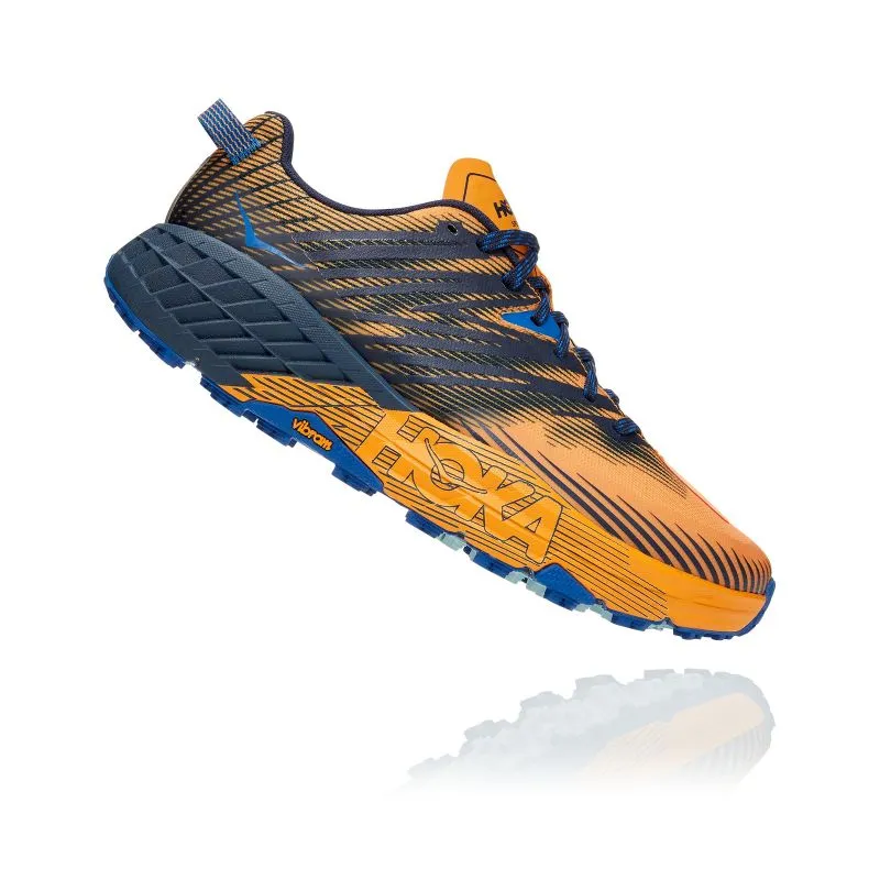 Zapato de pista Hoka One One Speedgoat 4 (SAFFRON/IRIS NEGRO) Hombre